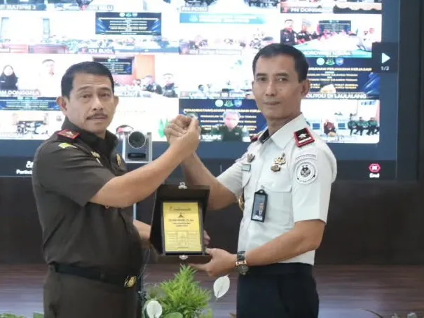 Kejati, Pengadilan Tinggi, dan Kanwil Ditjen Pemasyarakatan Sulteng Jalin Kerja Sama Pelaksanaan Sidang Secara Elektronik