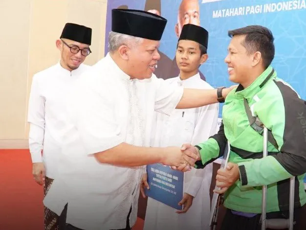 Kajati Dr Harli Siregar Beri Santunan kepada Yatim Piatu dan Disabilitas di Buka Puasa Bersama MPI Sumut
